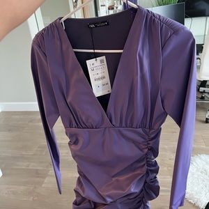 Beautiful color! Zara purple faux leather long sleeve dress! Looks amazing on!
